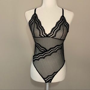 Savage X fishnet and lace bodysuit
